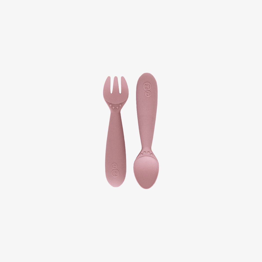 https://www.satarahome.com/cdn/shop/products/ezpz-fun-silicone-spoon-and-fork-utensils-blush_2000x.jpg?v=1621969601